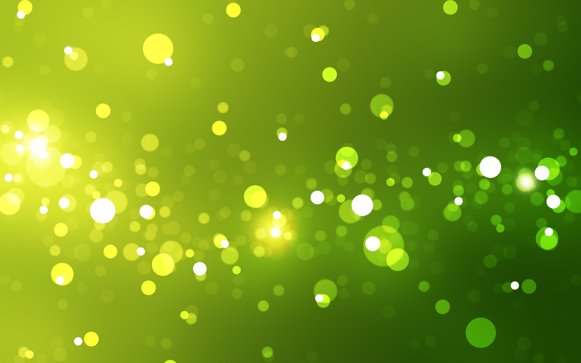 Abstract colorful green-yellow bokeh of glowing orbs and light flares — 2K Quad HD PC desktop wallpaper/background.
