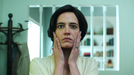 HD PC desktop wallpaper featuring Eva Green from the movie White Bird in a Blizzard, showing a close-up of her contemplative expression.