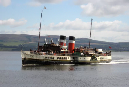 PS Waverley paddle steamer cruising on calm water with twin red-and-black funnels and scenic hills — HD PC desktop wallpaper background.