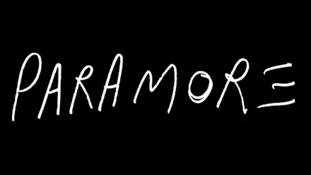 HD desktop wallpaper featuring the band name Paramore in white handwritten text on a black background, reflecting a music-themed design.