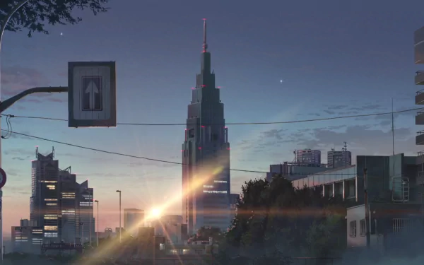 A stunning sunset over Tokyo, featuring tall buildings and a prominent structure reminiscent of scenes from the anime Your Name. This HD wallpaper captures the city's vibrant atmosphere.