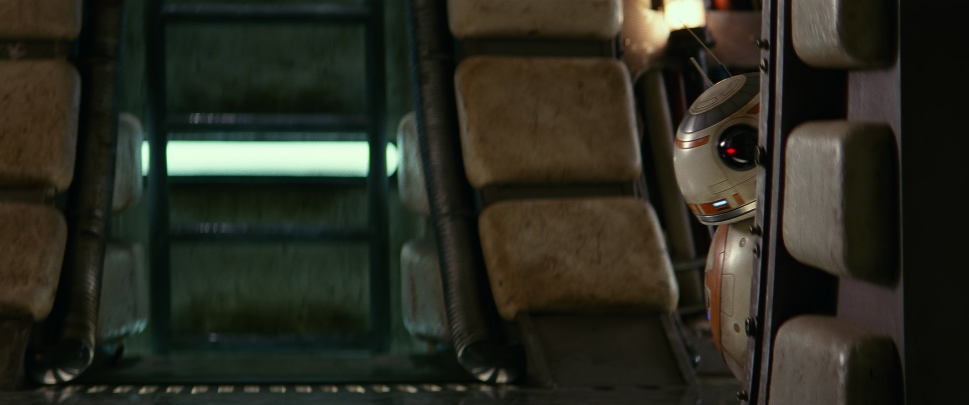 BB-8 from Star Wars Episode VII: The Force Awakens peeks from behind a wall, showcasing vibrant colors and intricate details in this HD PC desktop wallpaper.