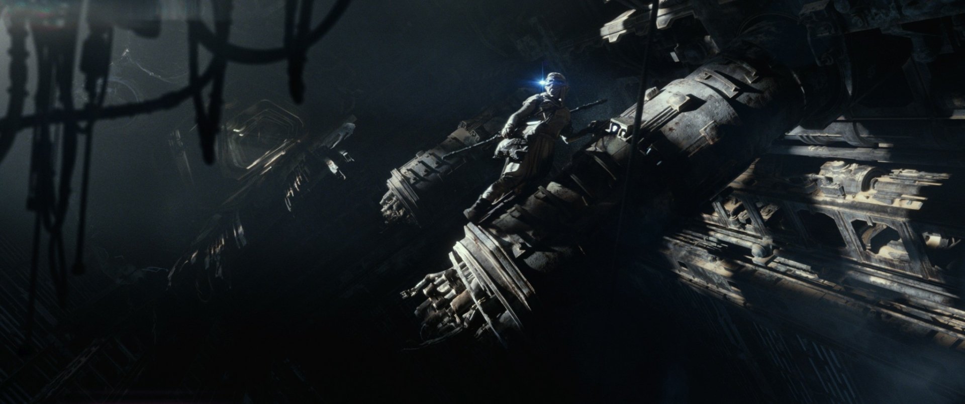 A striking HD desktop wallpaper featuring Rey from Star Wars, set against the backdrop of a dark space scene with detailed wreckage, capturing the essence of Star Wars Episode VII: The Force Awakens.