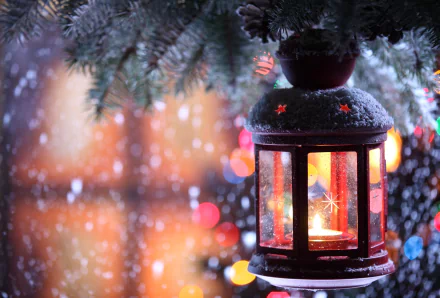 A snow-covered lantern with a glowing candle hangs among Christmas ornaments and decorations, set against a festive, colorful background. This HD wallpaper captures the essence of the holiday season.