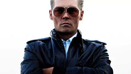 HD PC desktop wallpaper featuring a serious character from the movie Black Mass wearing sunglasses and a dark jacket against a white background.