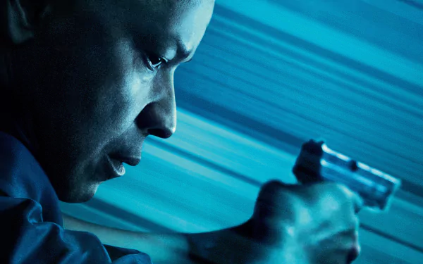 HD PC desktop wallpaper: close-up profile of a man from the movie The Equalizer aiming a handgun amid streaked blue motion blur.