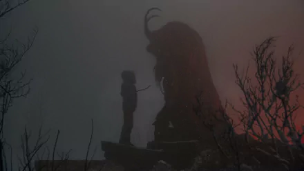 HD PC desktop wallpaper featuring a dark, foggy scene from the movie Krampus, showing a silhouette of a creature and a person in a spooky, atmospheric setting.
