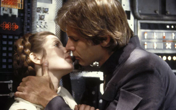 Carrie Fisher and Harrison Ford share a passionate kiss as Princess Leia Organa and Han Solo in a scene from Star Wars Episode V: The Empire Strikes Back.