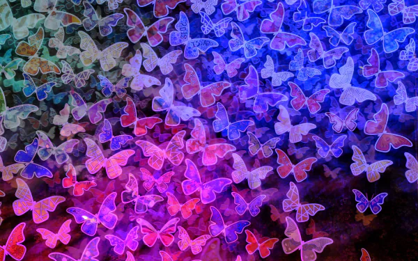 A vibrant HD PC desktop wallpaper featuring colorful blue and pink butterflies in a dynamic, abstract pattern.