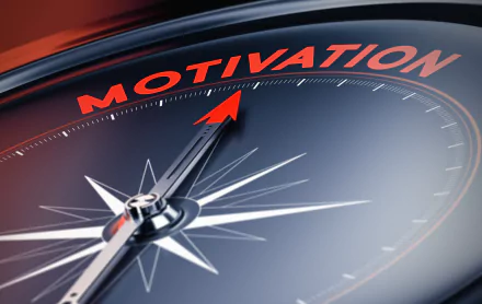 A close-up of a compass with the word MOTIVATION prominently displayed, set against a sleek dark background, designed as a 4K Ultra HD PC desktop wallpaper.