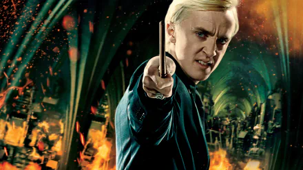 A dramatic HD wallpaper from Harry Potter and the Deathly Hallows: Part 2, featuring a character wielding a wand against a fiery, chaotic backdrop.