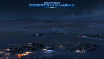 HD wallpaper featuring a nighttime scene from Homeworld: Deserts of Kharak with illuminated structures and vehicles in a vast desert.