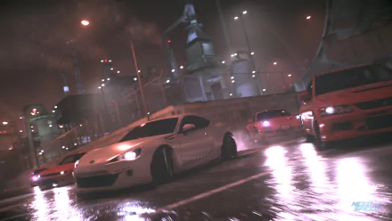 High-speed cars race through a wet urban street at night in this 4K Ultra HD PC desktop wallpaper from the video game Need For Speed (2015).
