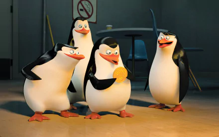 HD PC desktop wallpaper featuring the four animated penguins from the movie Penguins of Madagascar in a dimly lit room.