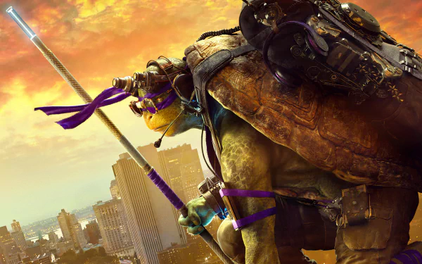 Donatello from the movie Teenage Mutant Ninja Turtles: Out of the Shadows, stands poised on a city rooftop at sunset, wielding his staff and showcasing his vibrant purple bandana.