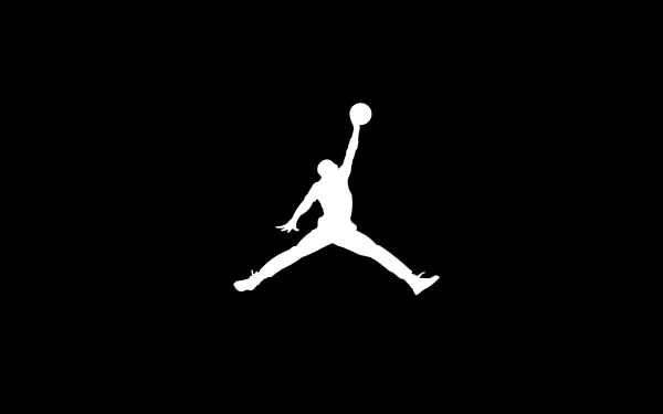 HD desktop wallpaper featuring the iconic silhouette of Michael Jordan mid-jump against a black background.