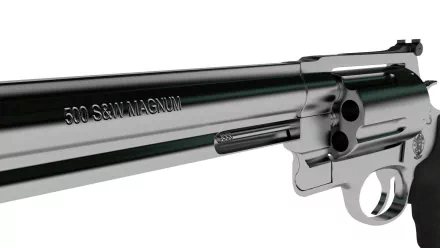 Close-up HD desktop wallpaper of a Smith & Wesson Model 500 revolver barrel showcasing the 500 S&W Magnum engraving on a reflective metal surface.