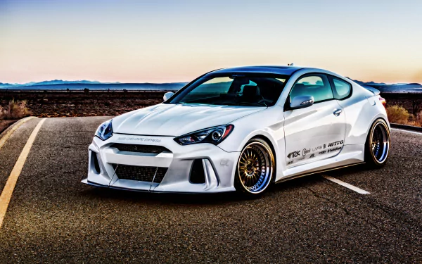 White Hyundai Genesis Coupe with custom body kit and gold mesh wheels parked on an open road at sunset — 2K Quad HD PC desktop wallpaper/background.