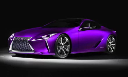 A striking purple Lexus car is showcased in this HD desktop wallpaper, highlighting its sleek design and modern features against a dark background.