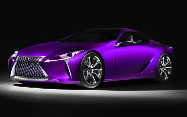 A striking purple Lexus car is showcased in this HD desktop wallpaper, highlighting its sleek design and modern features against a dark background.