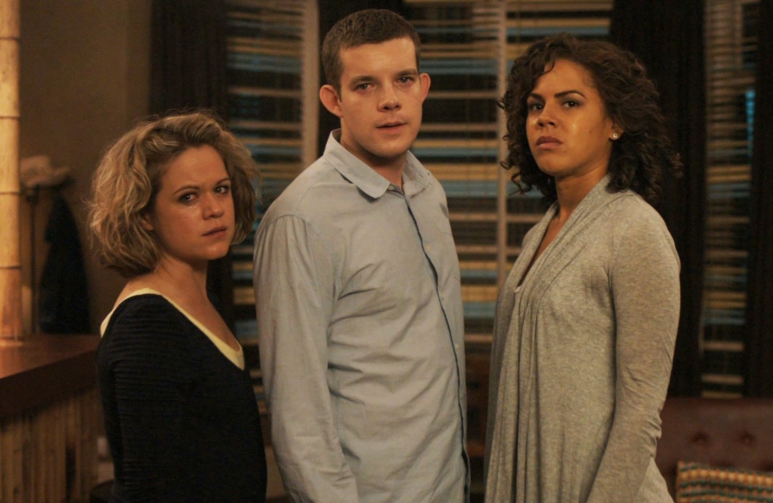 HD desktop wallpaper featuring Annie Sawyer, George Sands, and Nina Pickering from the TV show Being Human, standing together indoors with serious expressions.