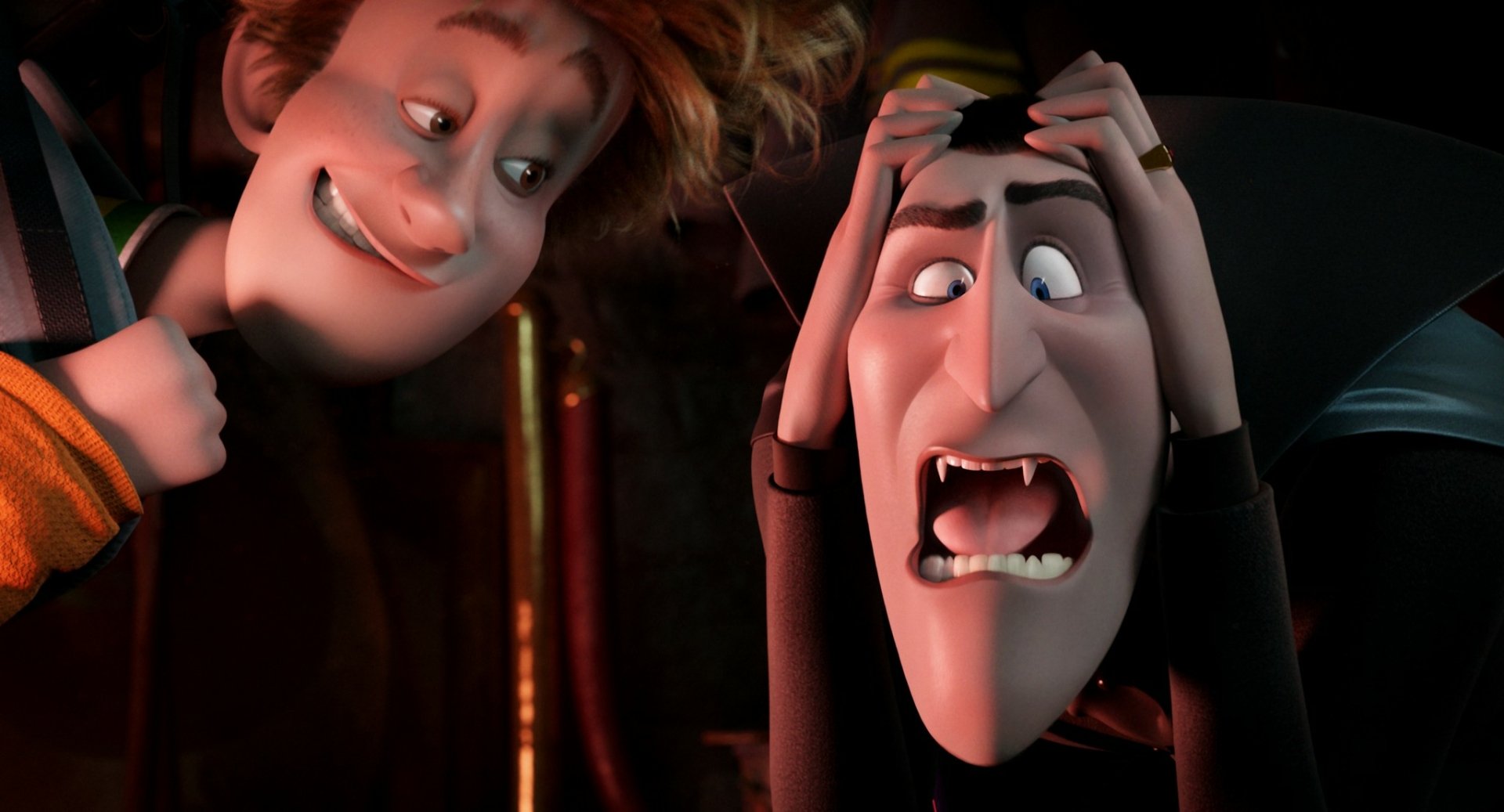 HD PC desktop wallpaper featuring Dracula and Jonathan from the Hotel Transylvania movie, showing a humorous and expressive moment between the two characters.