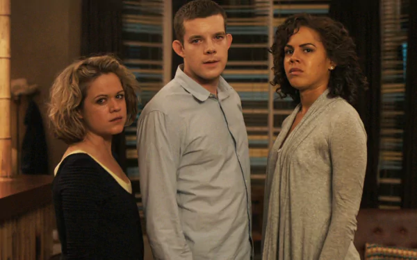 HD desktop wallpaper featuring Annie Sawyer, George Sands, and Nina Pickering from the TV show Being Human, standing together indoors with serious expressions.