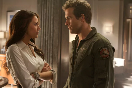 Blake Lively and Ryan Reynolds as Carol Ferris and Hal Jordan in a scene from the Green Lantern movie, featured in an HD PC desktop wallpaper background.