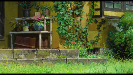 Lush garden scene from the anime The Secret World of Arrietty, featured as an HD PC desktop wallpaper with vibrant greenery and detailed foliage.