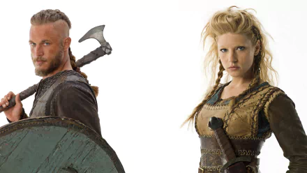 Lagertha and Ragnar Lothbrok from the TV show *Vikings* (2013) are featured in this HD desktop wallpaper, showcasing Katheryn Winnick and Travis Fimmel's iconic characters.