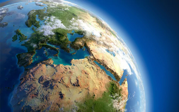 HD desktop wallpaper showing a detailed Earth from space, focusing on Europe and surrounding regions, highlighting natural landscapes and planetary features.