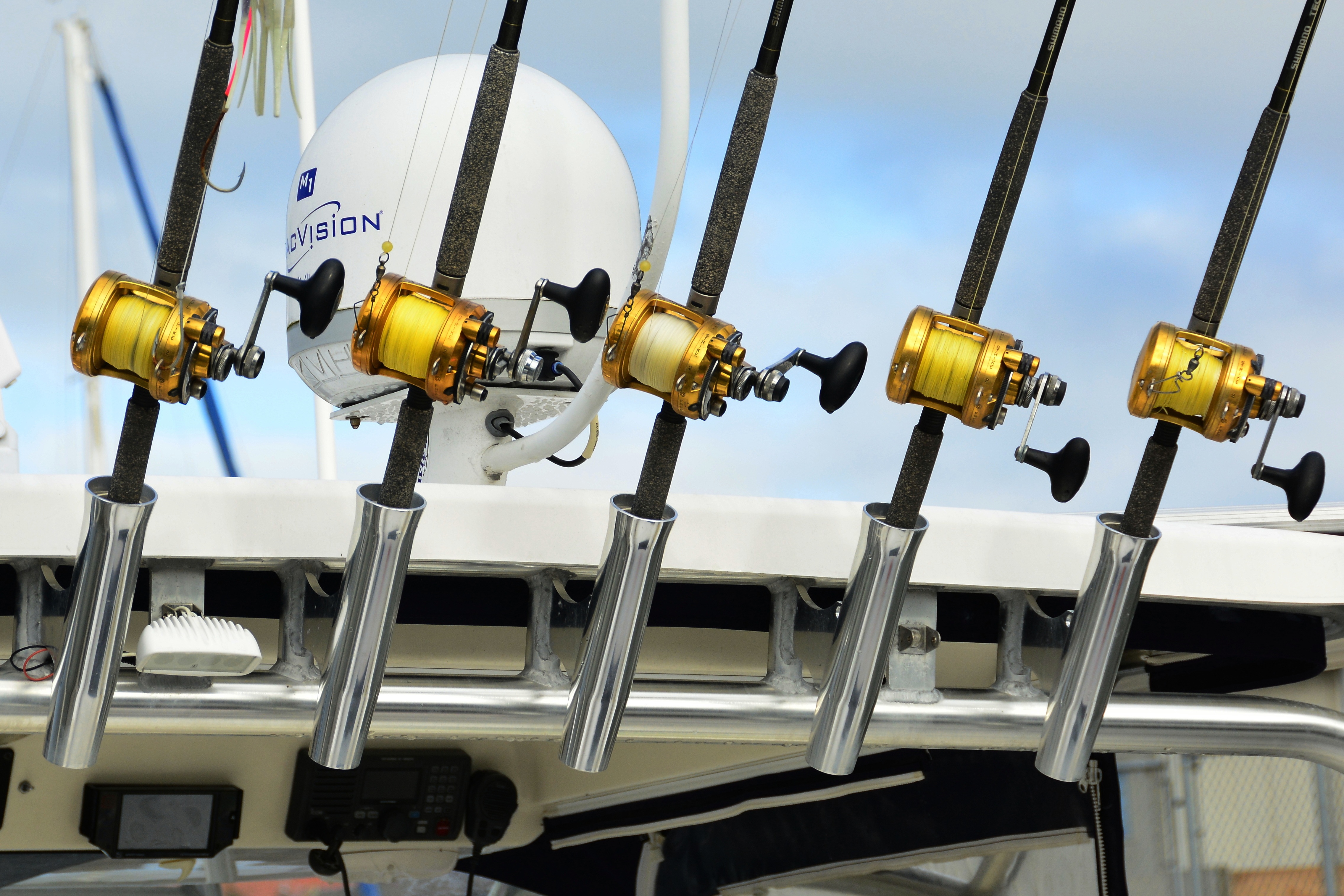 Deep sea fishing rods and reels on a boat by SHAWSHANK61