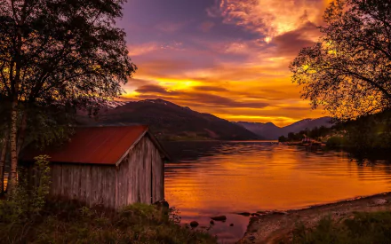 Boat House on Lake at Sunset