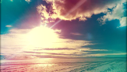 HD PC desktop wallpaper of a colorful, digitally enhanced landscape featuring clouds above an icy terrain under a bright sun.