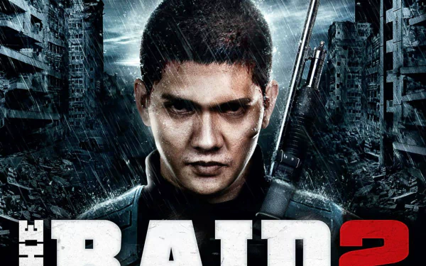 HD PC desktop wallpaper featuring a close-up of the intense lead character from the movie The Raid 2, set against a dark, urban background.