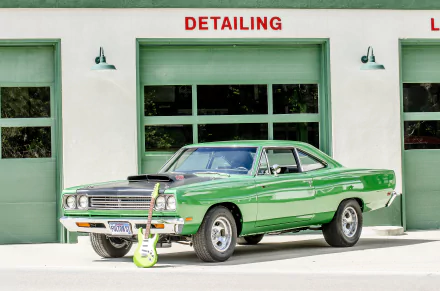  Plymouth Road Runner at a gas station with electric guitar by Lisa Johnson