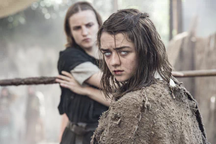 4K Ultra HD wallpaper featuring Arya Stark, portrayed by Maisie Williams, from the TV show Game of Thrones in a tense, dramatic scene.