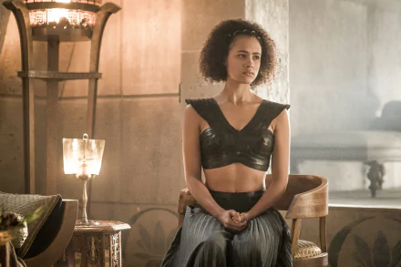 Nathalie Emmanuel as Missandei in Game of Thrones, captured in a dramatic scene, features a 4K Ultra HD resolution, showcasing her powerful presence and stunning visuals.