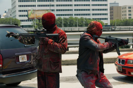 5K Ultra HD PC desktop wallpaper/background: scene from the movie Triple 9 showing two red-painted, masked gunmen aiming rifles between cars on an urban overpass.