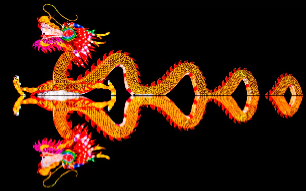 A vibrant Chinese New Year dragon illuminated at night, its bright lights perfectly reflected on the surface below, captured in stunning 4K Ultra HD resolution.