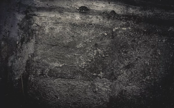 Dark abstract grunge texture with rough concrete detail — 5K Ultra HD PC desktop wallpaper and background.