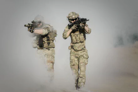 HD desktop wallpaper showing two soldiers in camouflage gear and rifles advancing through thick smoke, captured in a detailed cosplay scene.