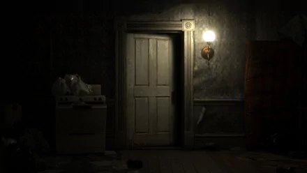 Dark, eerie room from Resident Evil 7: Biohazard featuring a closed door, dim wall lamp, and old stove, captured as an HD PC desktop wallpaper background.