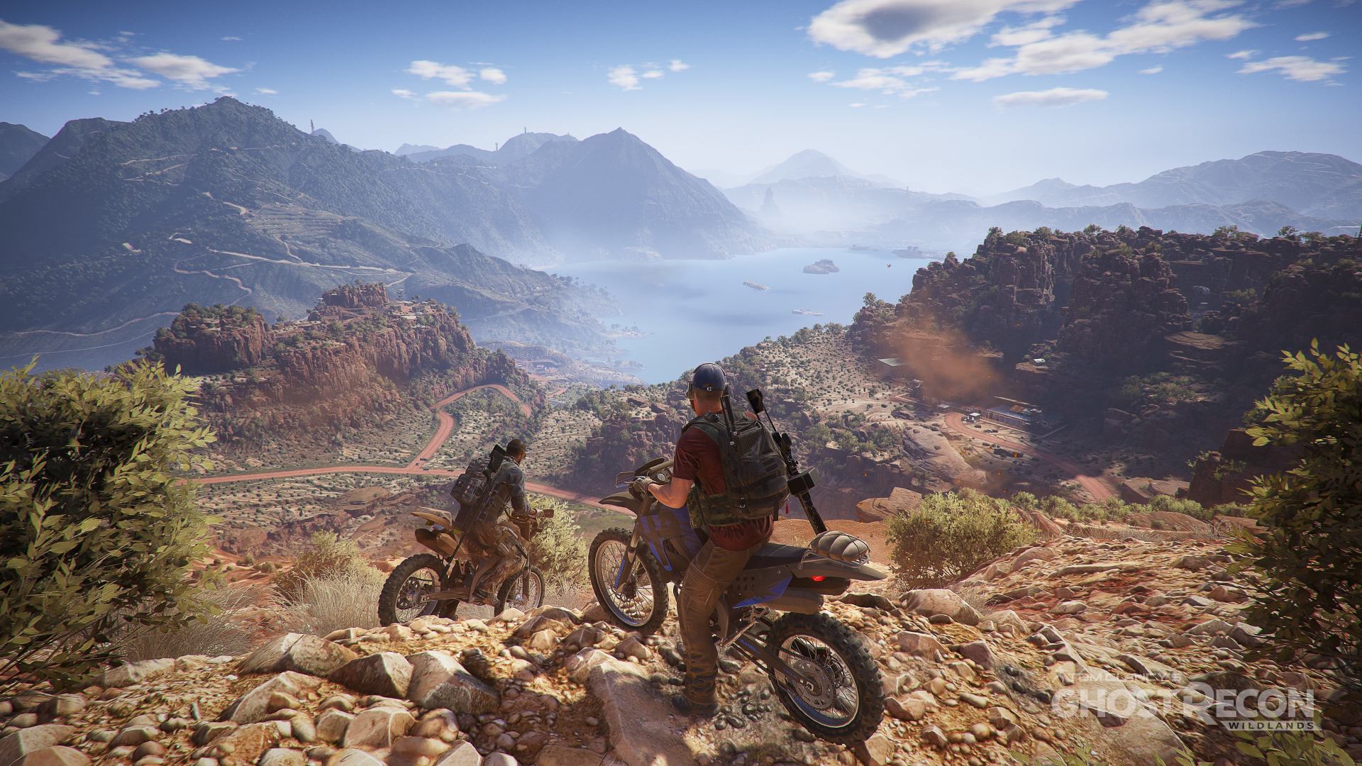 4K Ultra HD PC desktop wallpaper from the video game Tom Clancy’s Ghost Recon Wildlands, featuring two characters on dirt bikes overlooking a vast mountainous landscape.