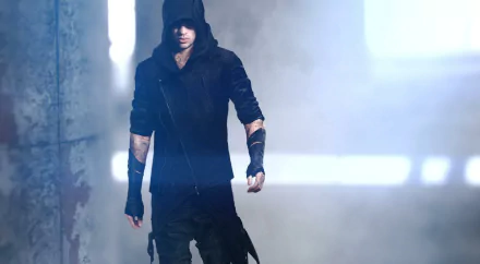 HD PC desktop wallpaper showing a hooded figure in dark urban mist with dramatic light beams — stylized video game art from Mirror's Edge Catalyst.