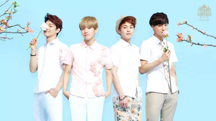 HD desktop wallpaper featuring four members of Exo in white outfits against a blue background, each holding a flower.