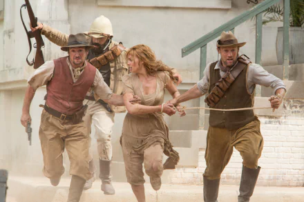 5K Ultra HD PC desktop wallpaper: action shot from The Legend of Tarzan movie — a period-dressed woman grabbed by two men in a dusty street as a soldier raises his rifle behind them.