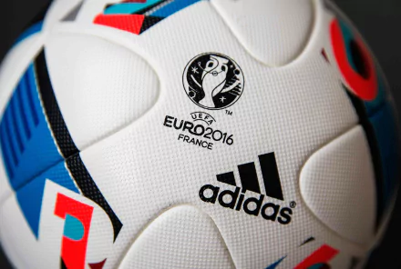 A close-up of an Adidas ball featuring the UEFA Euro 2016 logo, celebrating the tournament held in France. This HD image captures the essence of sports and competition.
