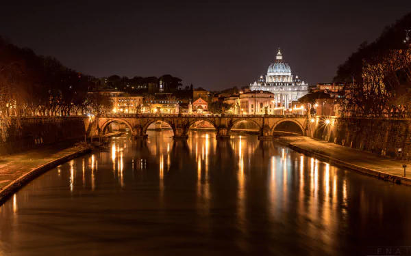 A serene night view of the illuminated bridges over the river in Rome, reflecting the soft lights against the water, with the iconic dome of St. Peter’s Basilica in the background.