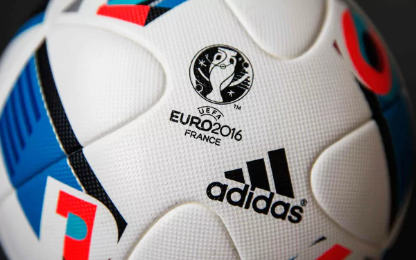 A close-up of an Adidas ball featuring the UEFA Euro 2016 logo, celebrating the tournament held in France. This HD image captures the essence of sports and competition.